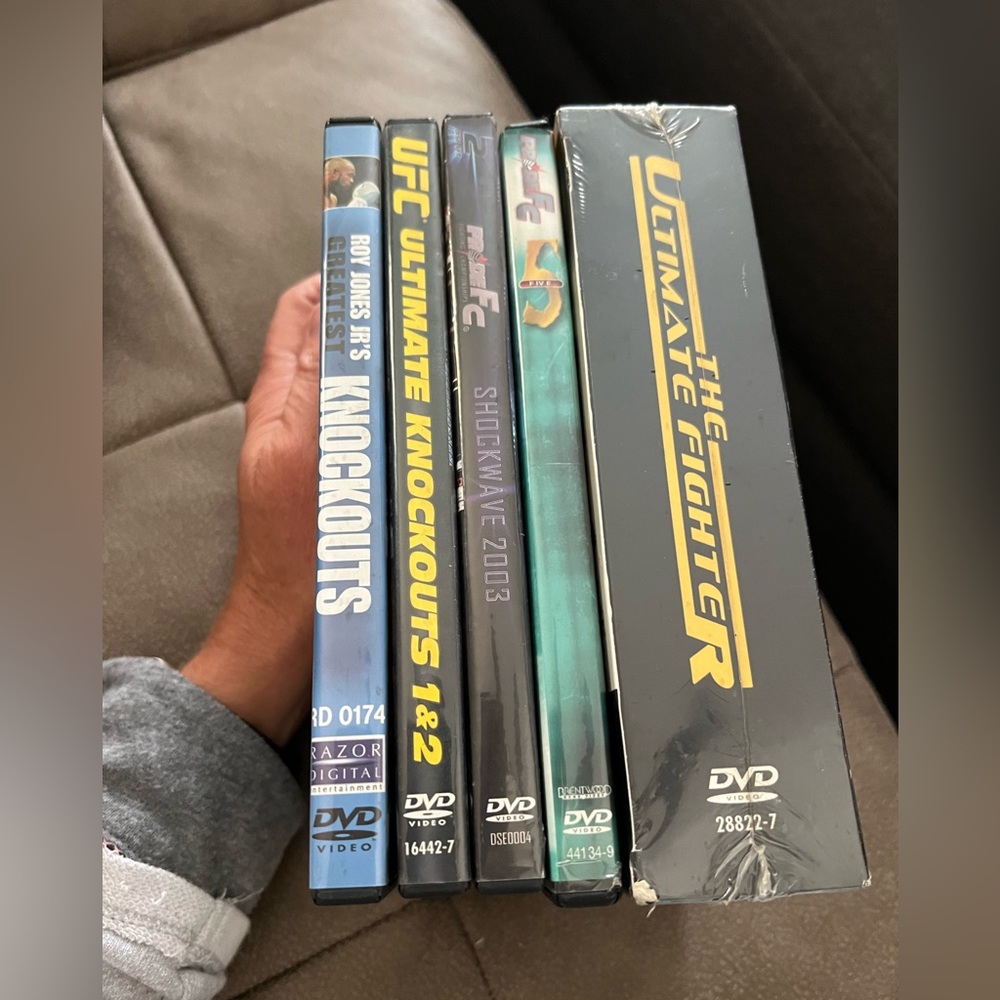 Set of 9 UFC DVDs Box set new!